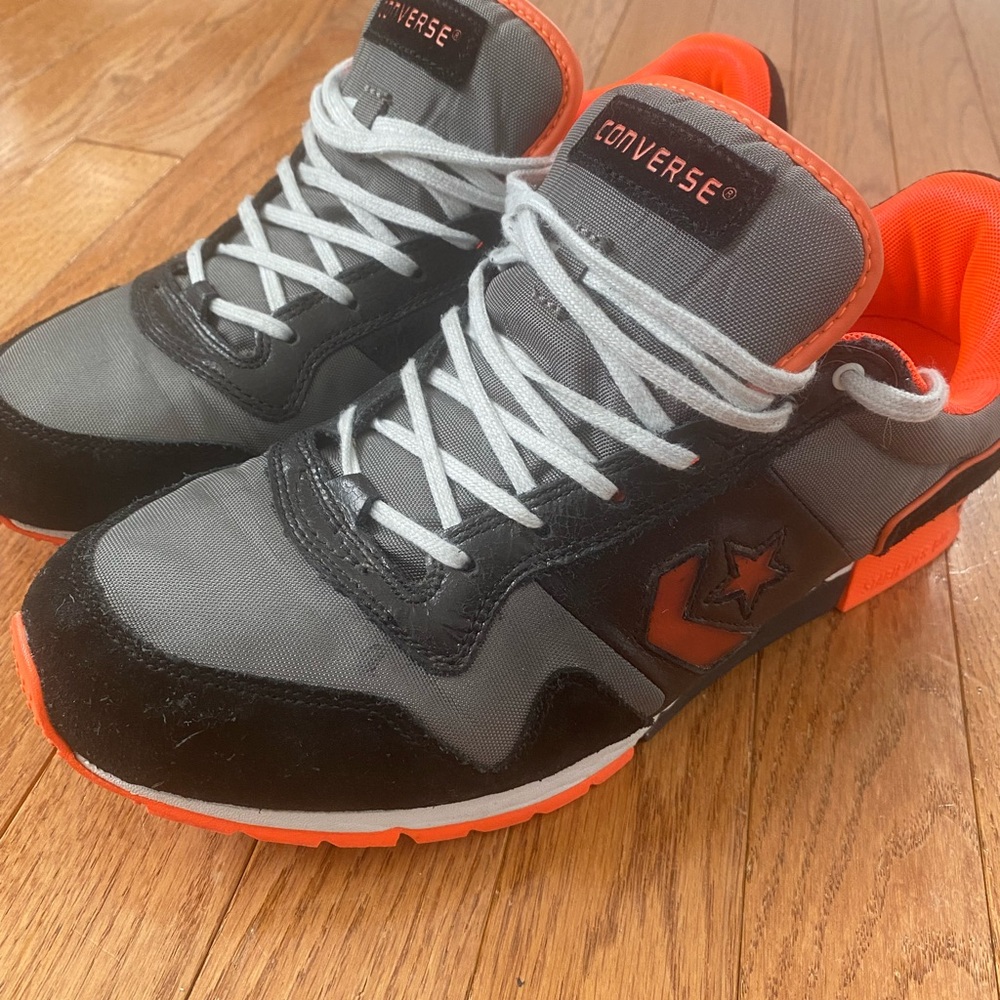 Converse Black and Orange Sneakers Dynamic Design
